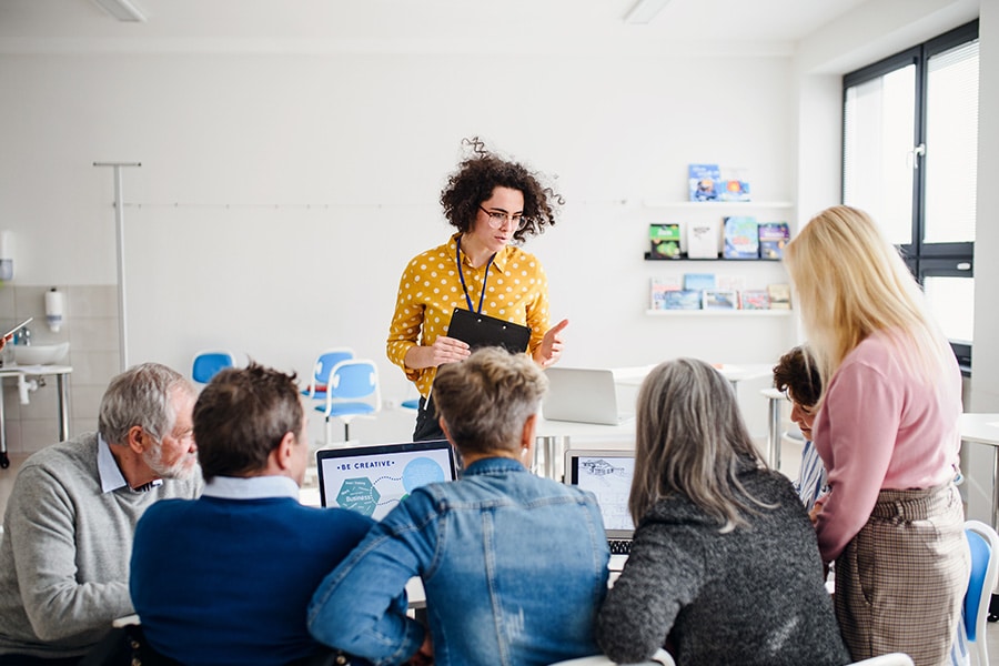 Group of people in class setting